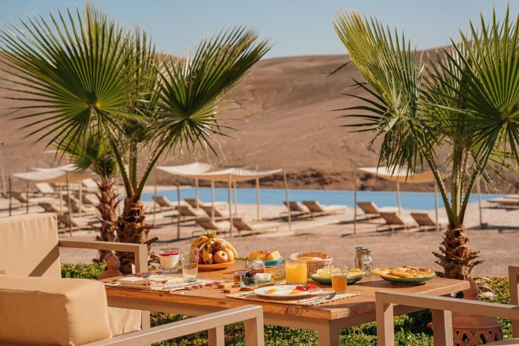 Coucher de soleil depuis la piscine d'Oxygen Lodge